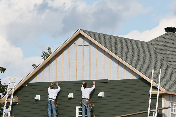 Professional Emergency Siding Repair technician working in Warsaw, IL